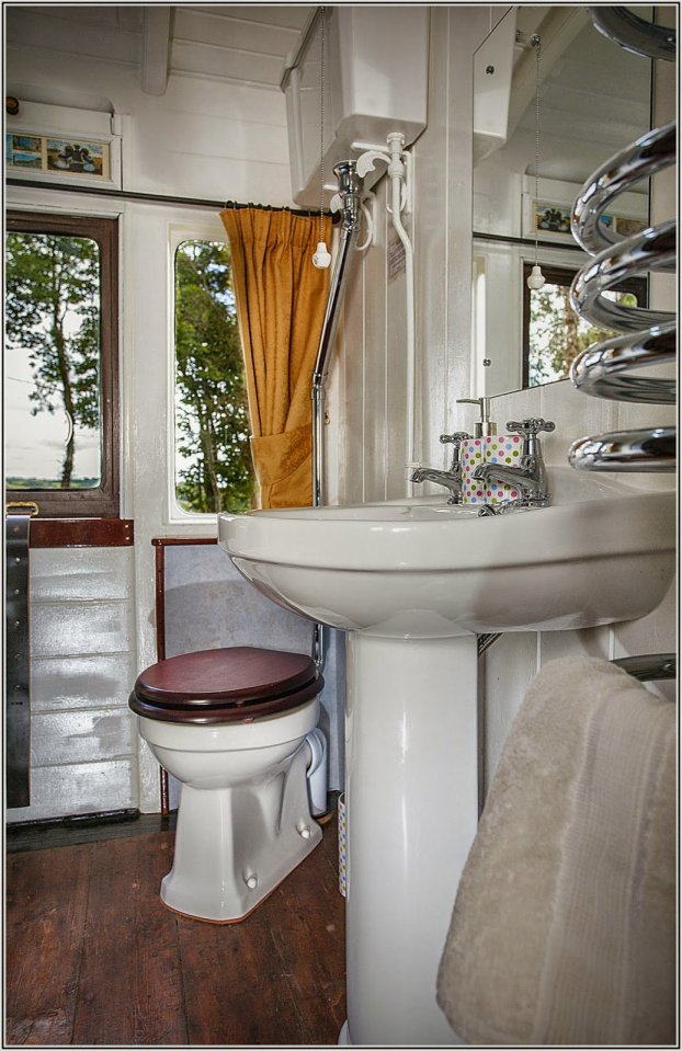 "Mevy", a Victorian-era train carriage converted into a self-contained two bedroom vacation rental suite. | www.facebook.com/SmallHouseBliss