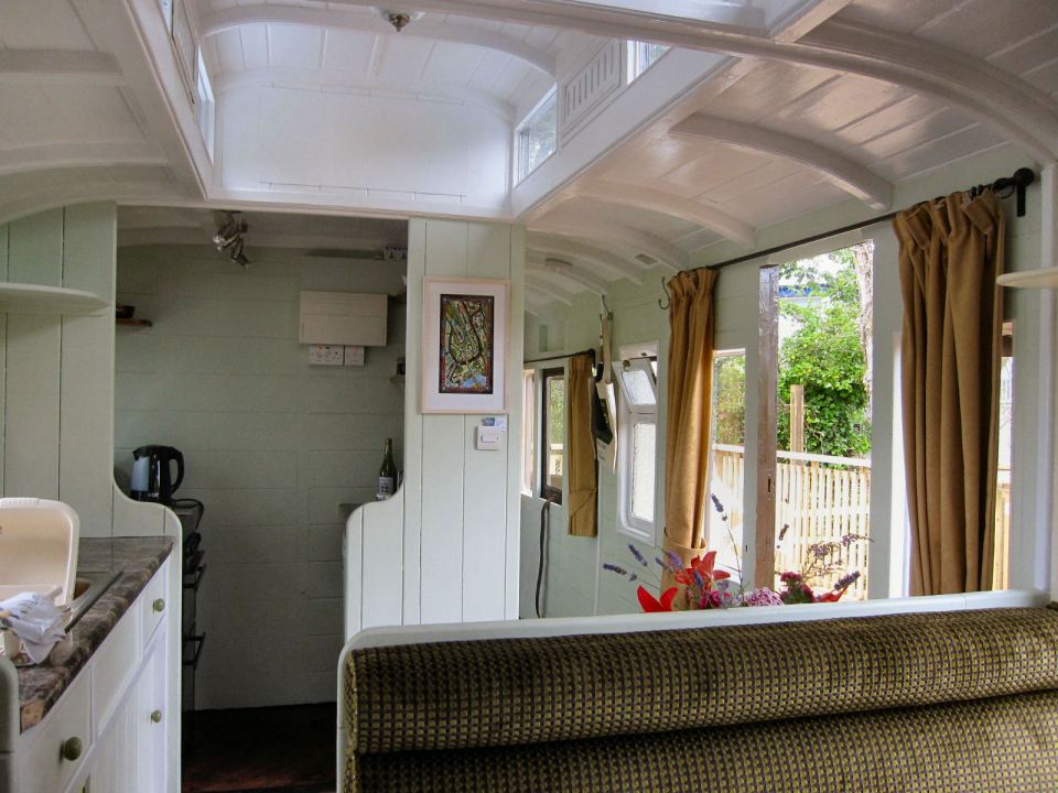 "Mevy", a Victorian-era train carriage converted into a self-contained two bedroom vacation rental suite. | www.facebook.com/SmallHouseBliss