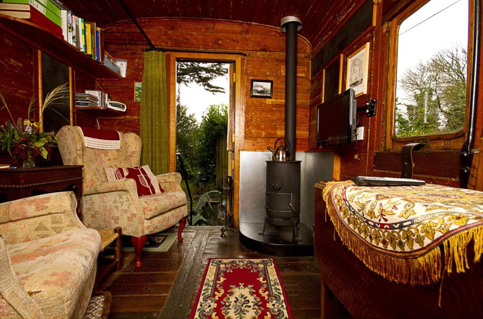 The Old Luggage Van, a Victorian-era railcar converted into a self-contained one bedroom vacation rental suite. | www.facebook.com/SmallHouseBliss