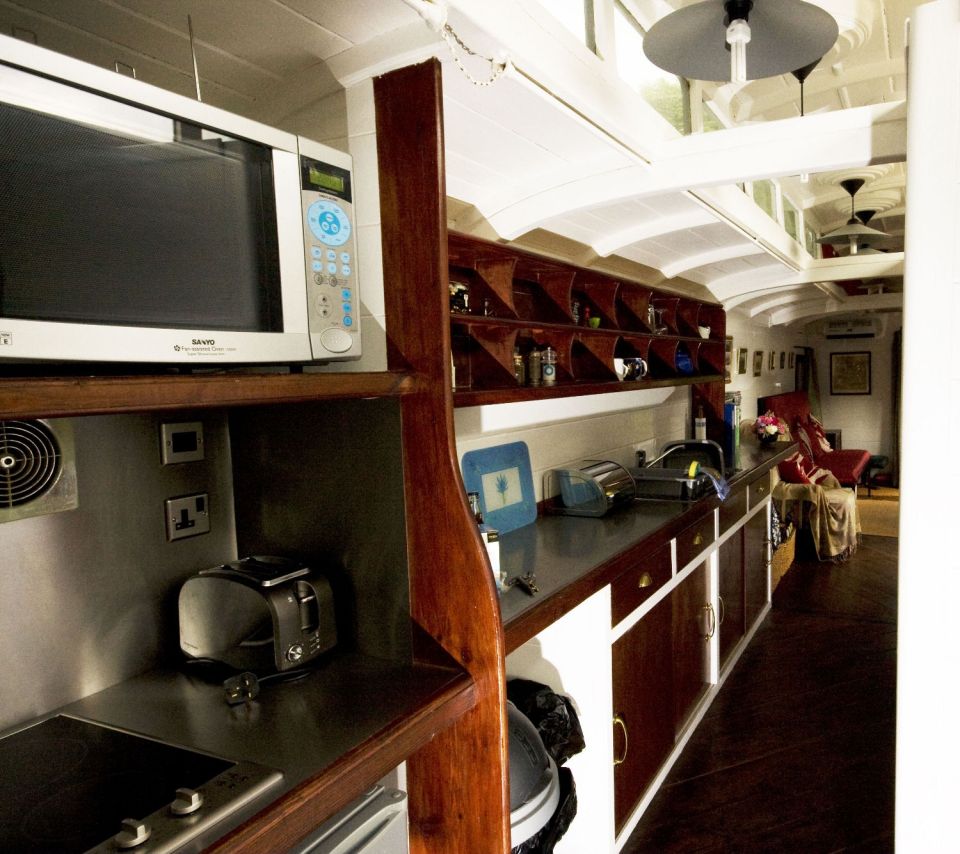 The Travelling Post Office, a Victorian-era railcar converted into a self-contained two bedroom vacation rental suite. | www.facebook.com/SmallHouseBliss