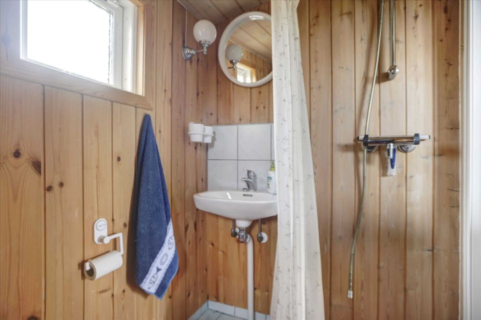 A tiny beach cottage in Denmark with one bedroom in only 280 sq ft. | www.facebook.com/SmallHouseBliss