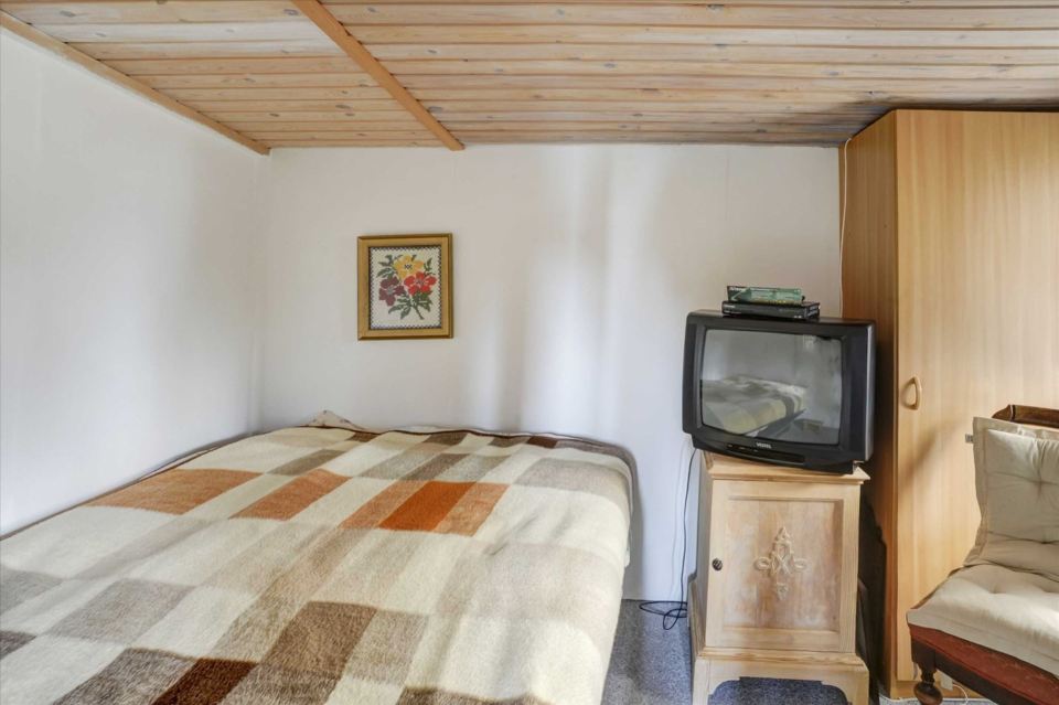 A tiny beach cottage in Denmark with one bedroom in only 280 sq ft. | www.facebook.com/SmallHouseBliss