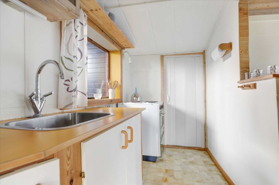 A tiny beach cottage in Denmark with one bedroom in only 280 sq ft. | www.facebook.com/SmallHouseBliss