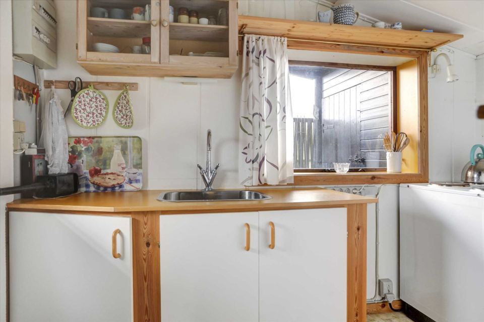 A tiny beach cottage in Denmark with one bedroom in only 280 sq ft. | www.facebook.com/SmallHouseBliss