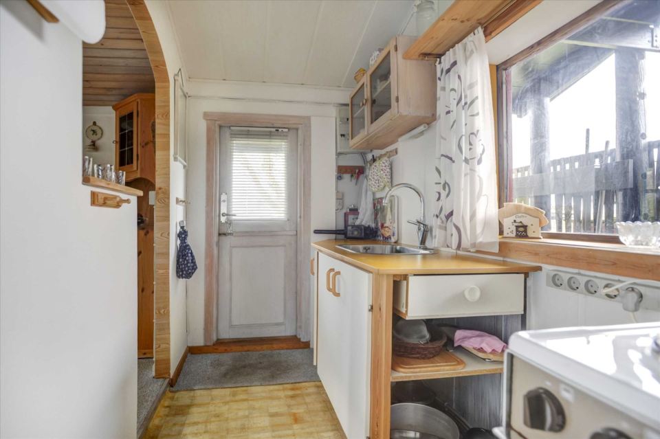 A tiny beach cottage in Denmark with one bedroom in only 280 sq ft. | www.facebook.com/SmallHouseBliss