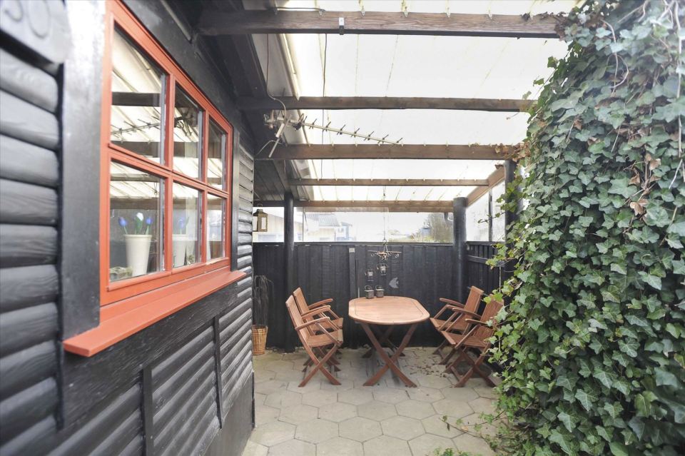 A tiny beach cottage in Denmark with one bedroom in only 280 sq ft. | www.facebook.com/SmallHouseBliss