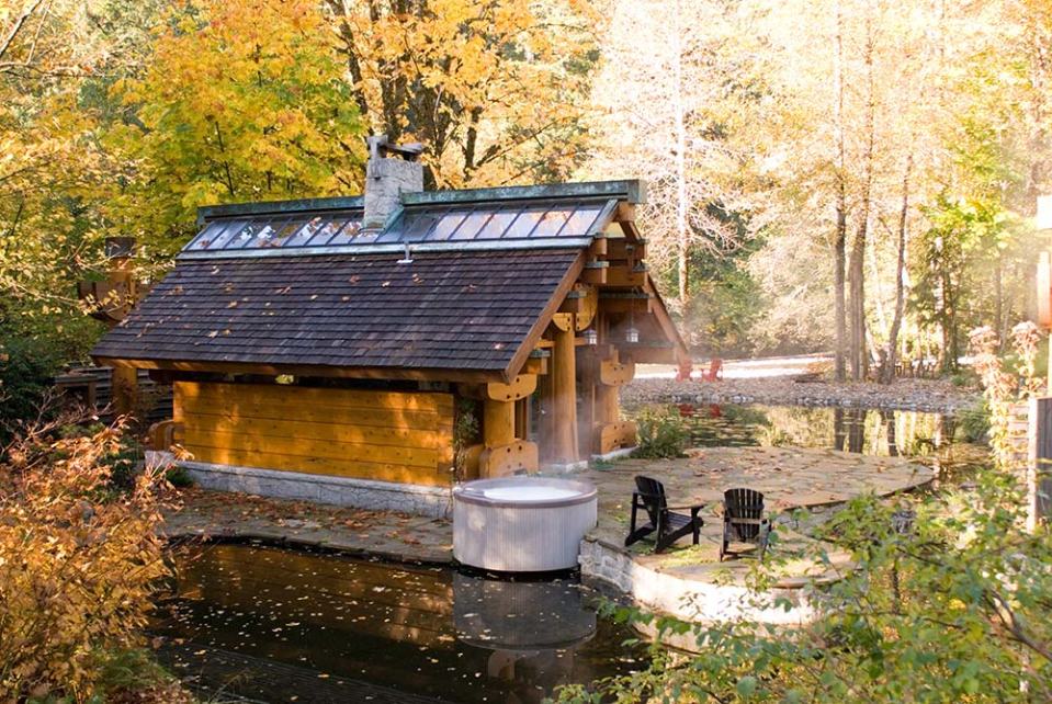 "The Totems" is a small log cabin with an almost mystical quality. It has 400 sq ft plus a sleeping loft. | www.facebook.com/SmallHouseBliss