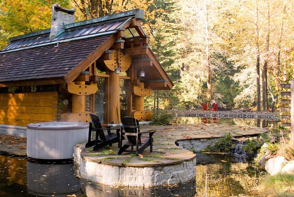 "The Totems" is a small log cabin with an almost mystical quality. It has 400 sq ft plus a sleeping loft. | www.facebook.com/SmallHouseBliss