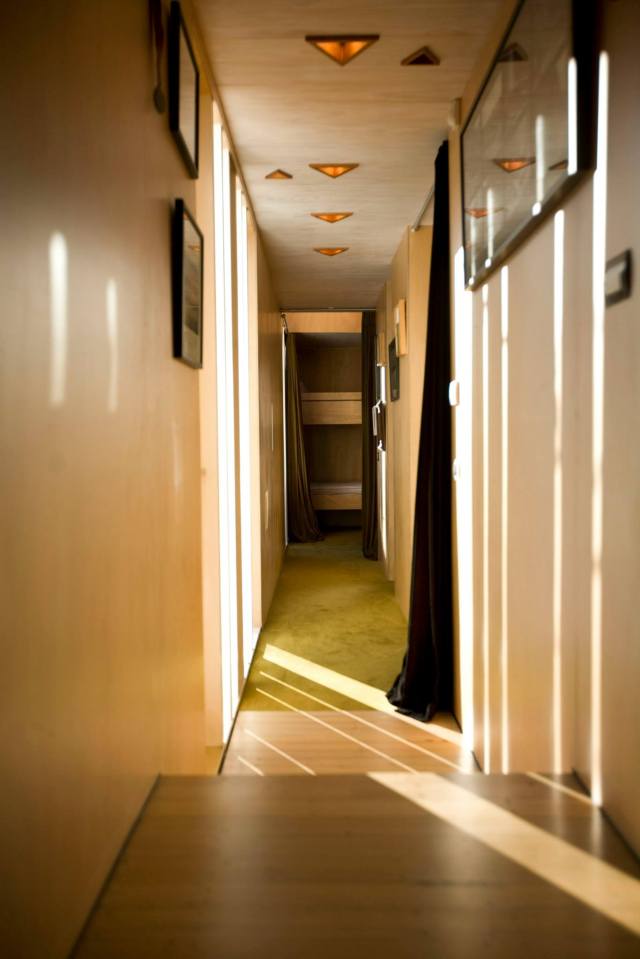 An architect designed and built this home for his own family of six. It has two bedrooms (one a large bunkroom) in 1,240 sq ft. | www.facebook.com/SmallHouseBliss