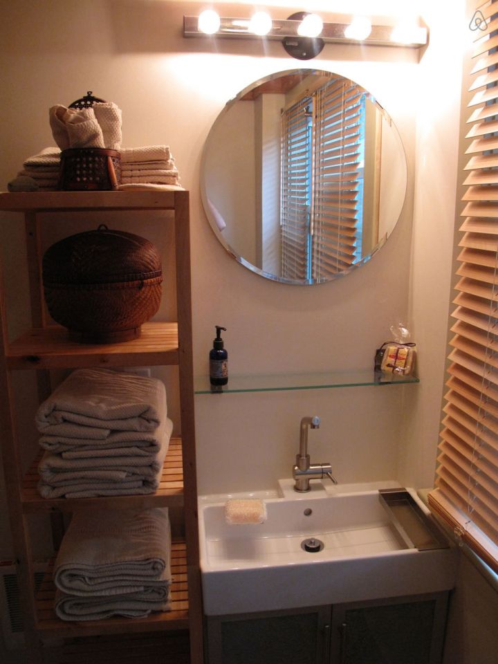 This tiny backyard cottage in Portland, Oregon, is likely a converted garage. It has 300 sq ft plus a sleeping loft. | www.facebook.com/SmallHouseBliss