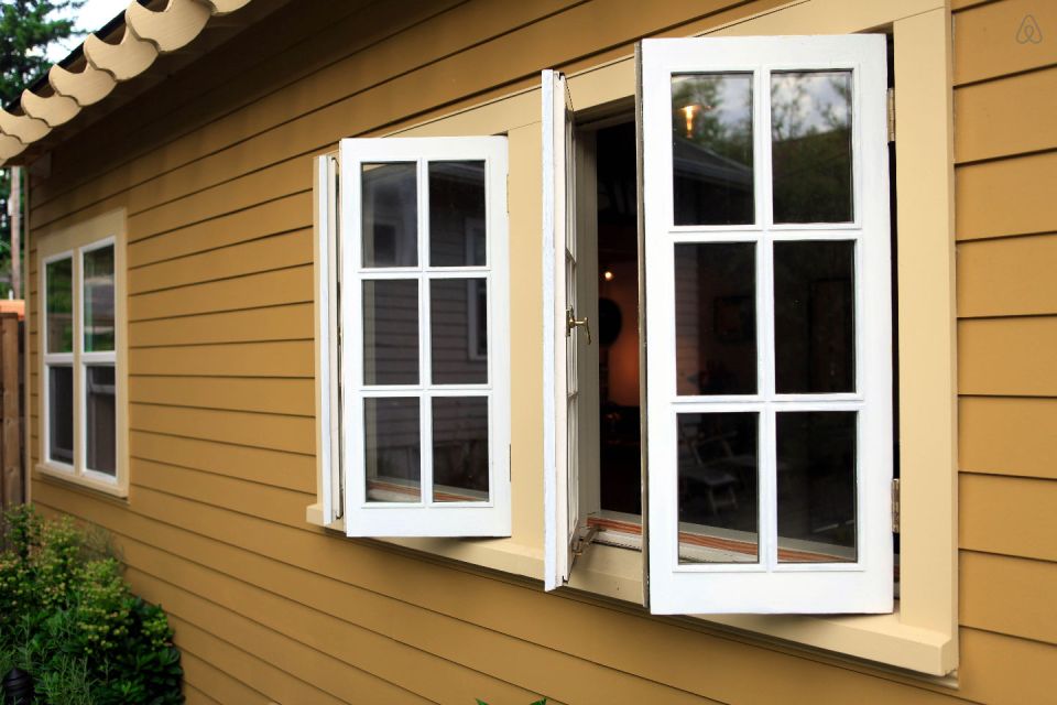 This tiny backyard cottage in Portland, Oregon, is likely a converted garage. It has 300 sq ft plus a sleeping loft. | www.facebook.com/SmallHouseBliss