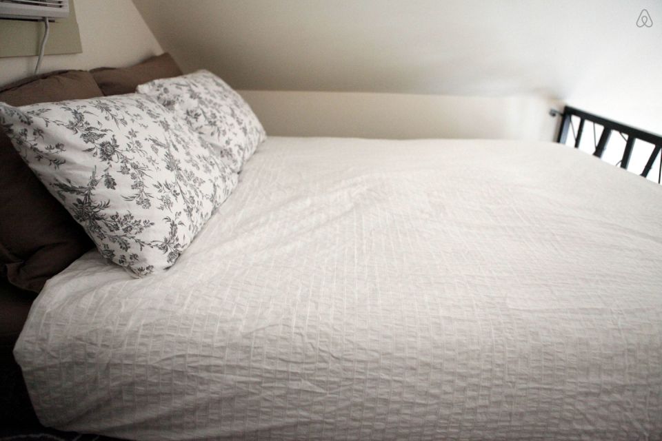 This tiny backyard cottage in Portland, Oregon, is likely a converted garage. It has 300 sq ft plus a sleeping loft. | www.facebook.com/SmallHouseBliss