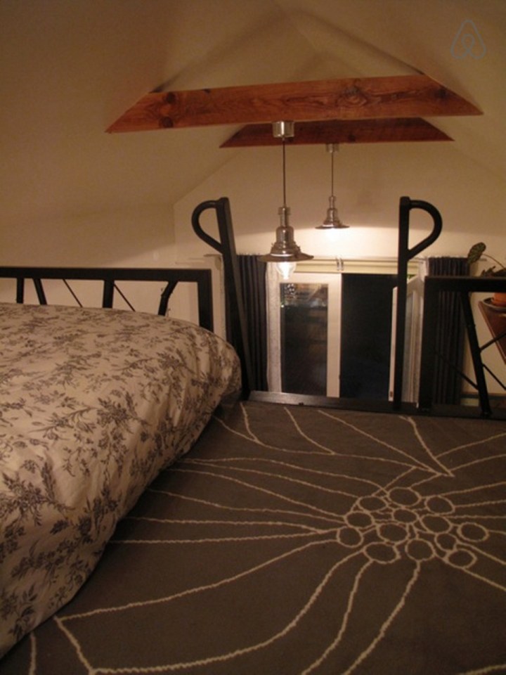 This tiny backyard cottage in Portland, Oregon, is likely a converted garage. It has 300 sq ft plus a sleeping loft. | www.facebook.com/SmallHouseBliss