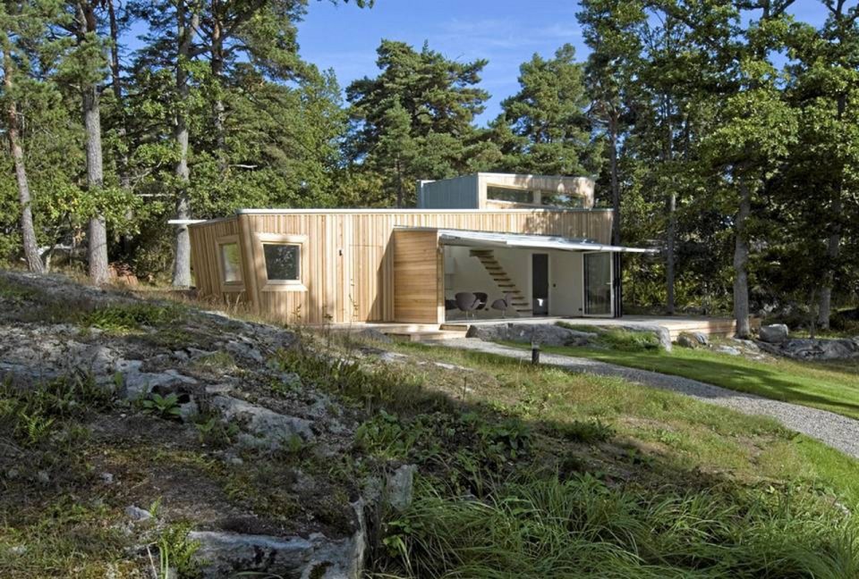 This low-impact modern cabin in Sweden has two bedrooms and a loft in 646 sq ft. | www.facebook.com/SmallHouseBliss
