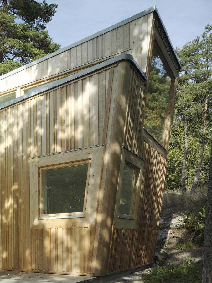 This low-impact modern cabin in Sweden has two bedrooms and a loft in 646 sq ft. | www.facebook.com/SmallHouseBliss