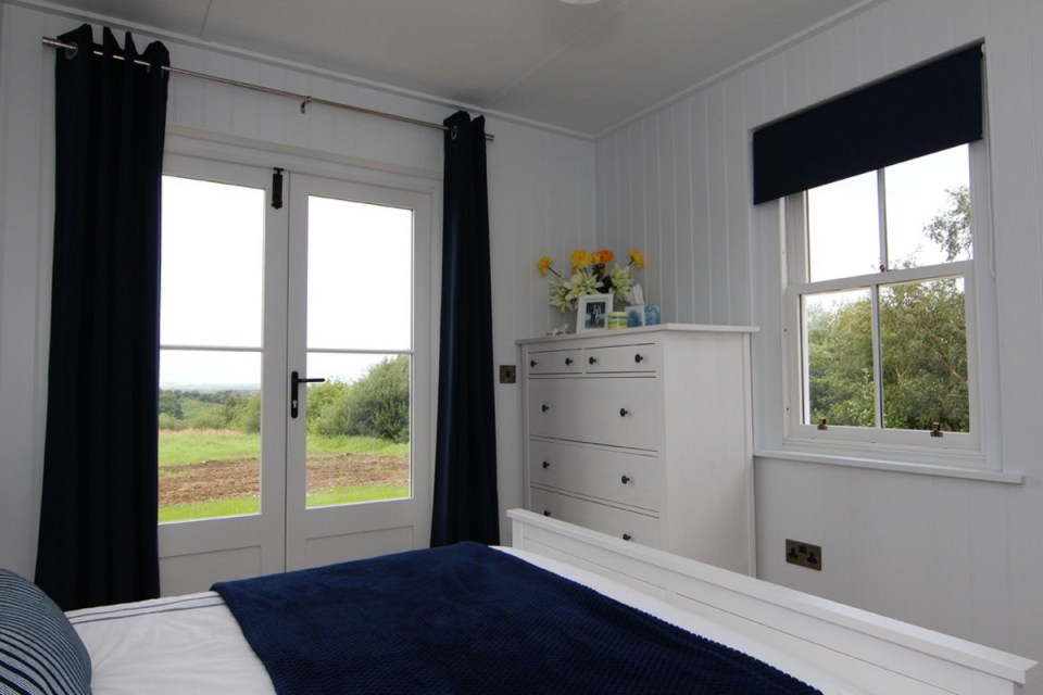 A small traditionally-styled Scottish house by modular builder The Wee House Company. This model has one bedroom in 431 sq ft. | www.facebook.com/SmallHouseBliss