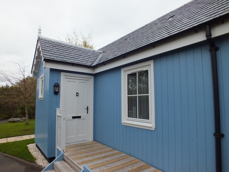 A small traditionally-styled Scottish house by modular builder The Wee House Company. This model has one bedroom in 431 sq ft. | www.facebook.com/SmallHouseBliss