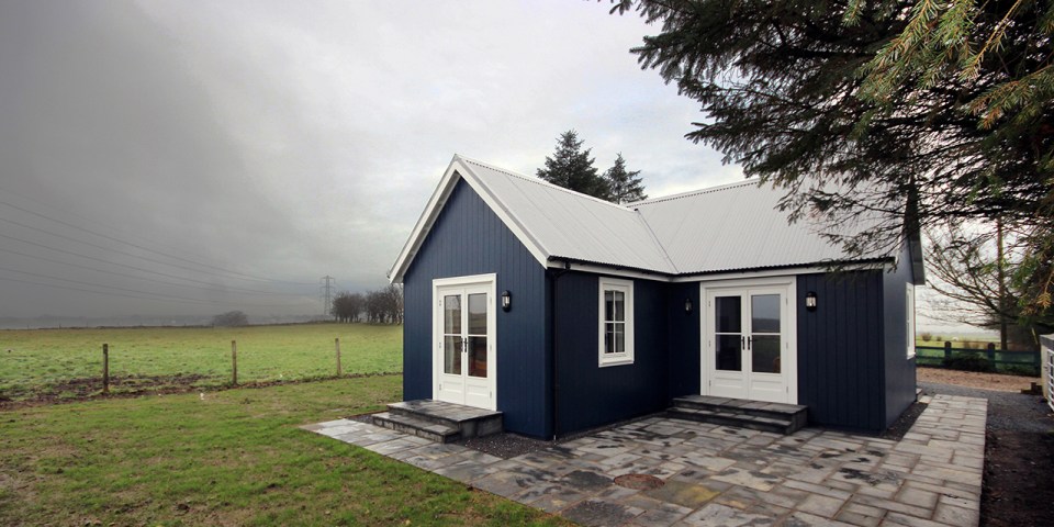 A small traditionally-styled Scottish house by modular builder The Wee House Company. This model has one bedroom in 431 sq ft. | www.facebook.com/SmallHouseBliss