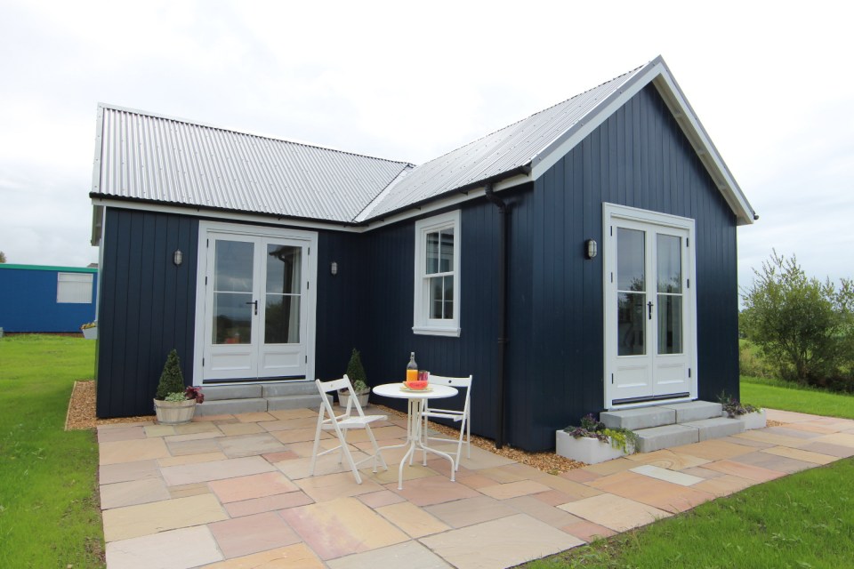 A small traditionally-styled Scottish house by modular builder The Wee House Company. This model has one bedroom in 431 sq ft. | www.facebook.com/SmallHouseBliss