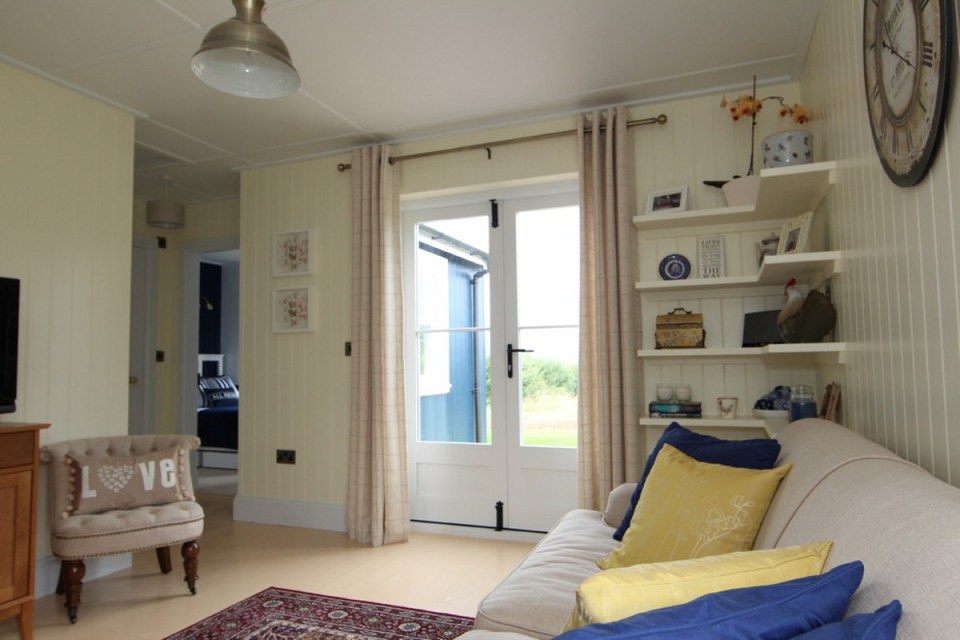 A small traditionally-styled Scottish house by modular builder The Wee House Company. This model has one bedroom in 431 sq ft. | www.facebook.com/SmallHouseBliss