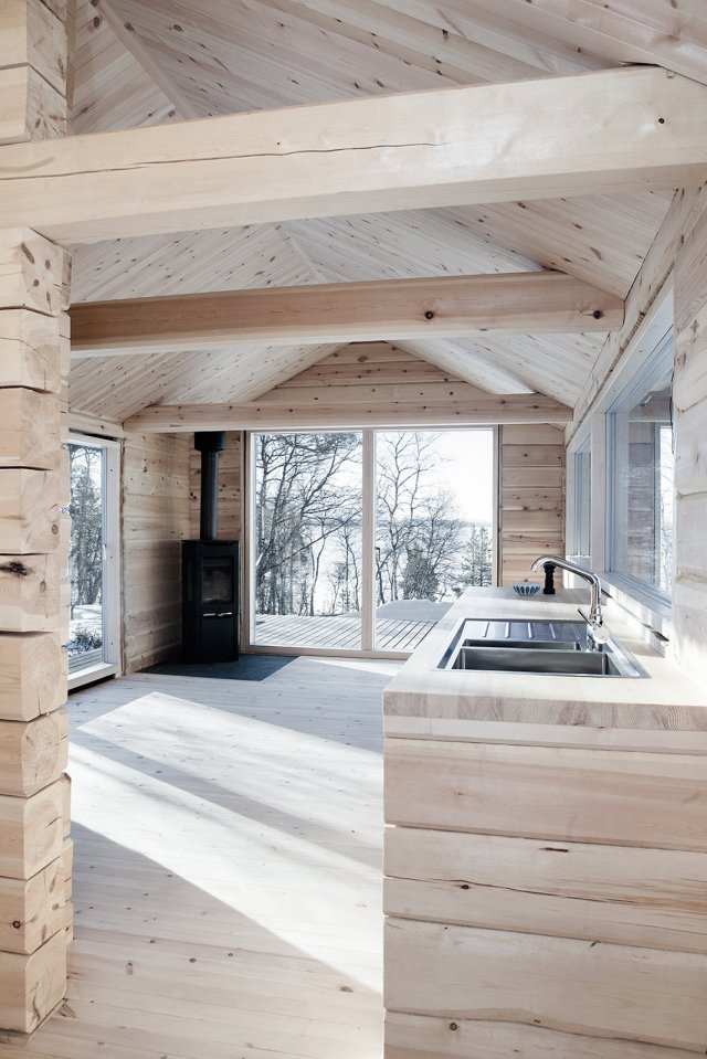 This log cabin in Norway joins a new structure to two existing one-room cabins, one over 100 years old. Together they have 3 bedrooms in 915 sq ft. | www.facebook.com/SmallHouseBliss