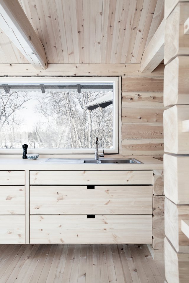 This log cabin in Norway joins a new structure to two existing one-room cabins, one over 100 years old. Together they have 3 bedrooms in 915 sq ft. | www.facebook.com/SmallHouseBliss