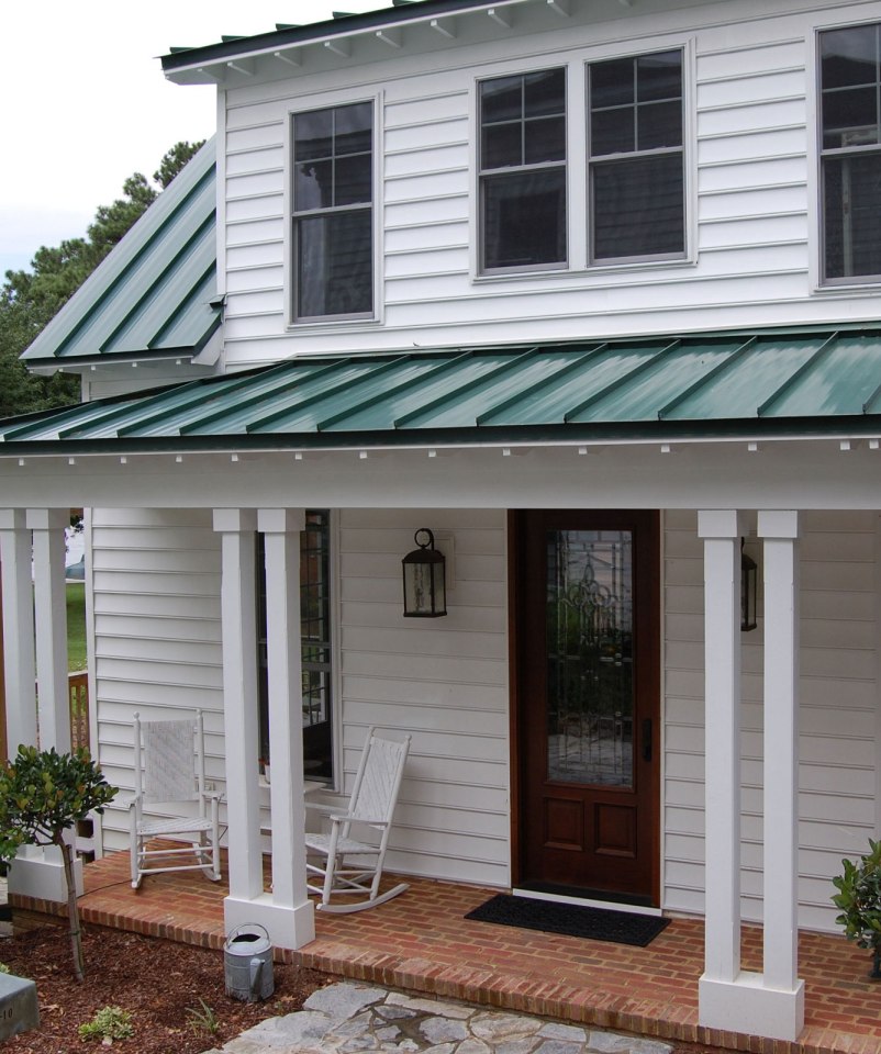 This traditional "Katrina Cottage" design has 3 bedrooms in 1,112 sq ft. | www.facebook.com/SmallHouseBliss