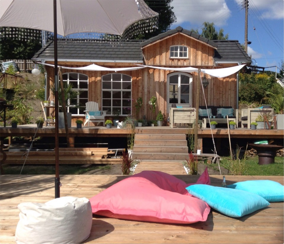 This small garden cottage located in an allotment garden has a kitchenette, half bath and sleeping loft in 258 sq ft. | www.facebook.com/SmallHouseBliss