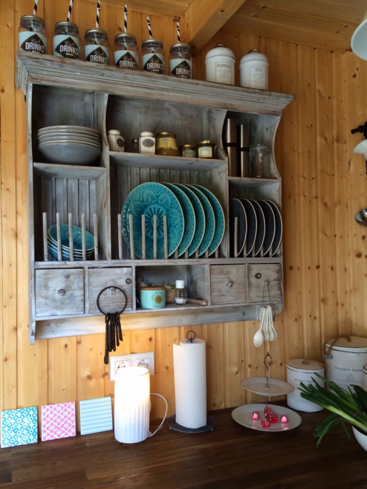 This small garden cottage located in an allotment garden has a kitchenette, half bath and sleeping loft in 258 sq ft. | www.facebook.com/SmallHouseBliss