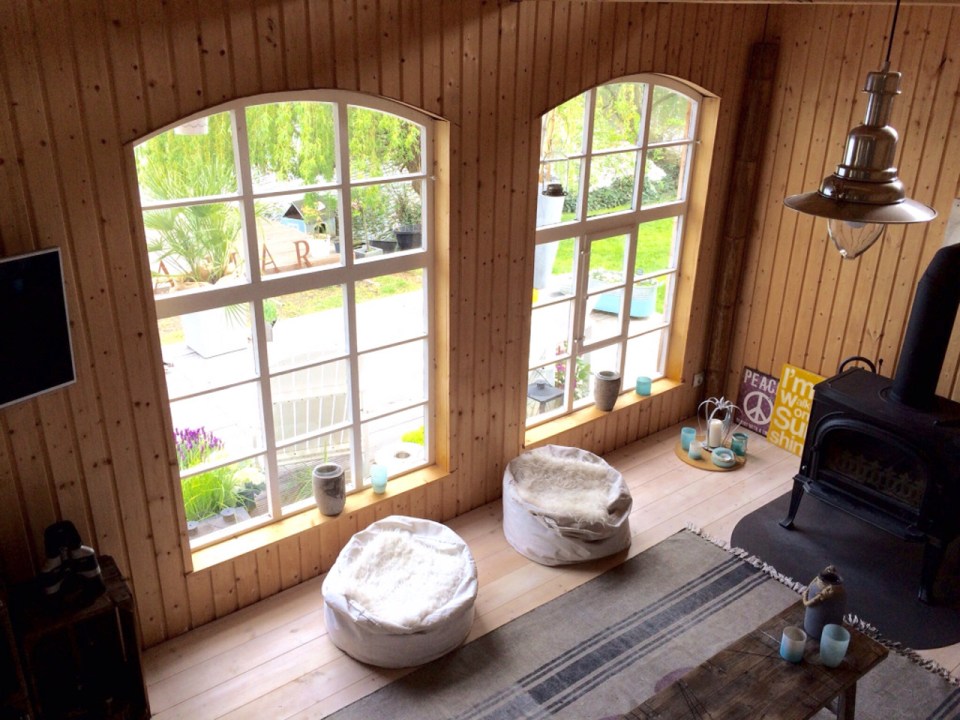 This small garden cottage located in an allotment garden has a kitchenette, half bath and sleeping loft in 258 sq ft. | www.facebook.com/SmallHouseBliss