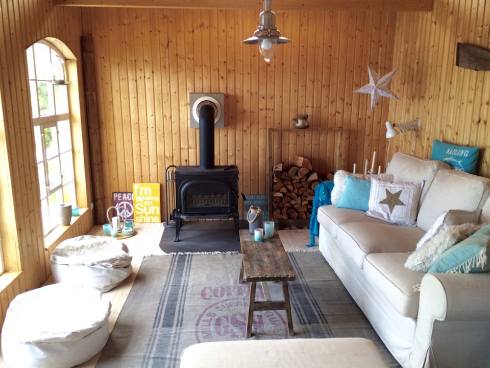 This small garden cottage located in an allotment garden has a kitchenette, half bath and sleeping loft in 258 sq ft. | www.facebook.com/SmallHouseBliss