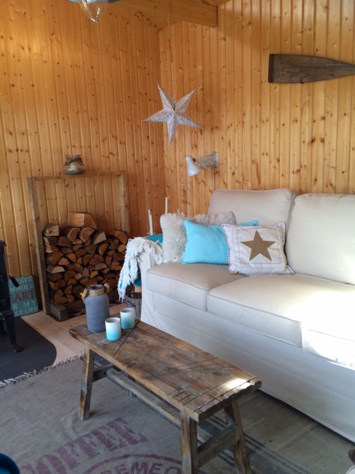 This small garden cottage located in an allotment garden has a kitchenette, half bath and sleeping loft in 258 sq ft. | www.facebook.com/SmallHouseBliss