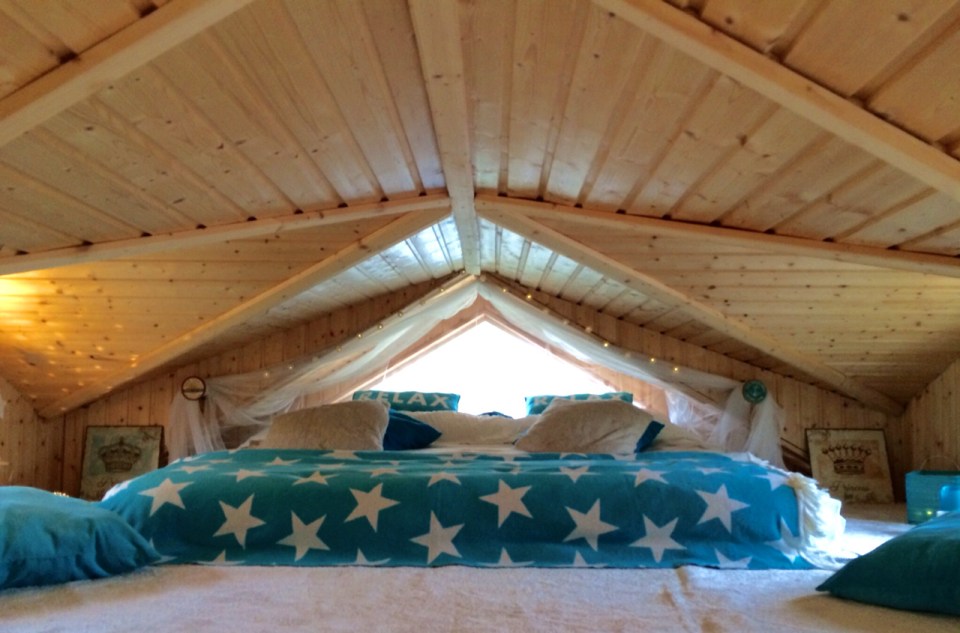 This small garden cottage located in an allotment garden has a kitchenette, half bath and sleeping loft in 258 sq ft. | www.facebook.com/SmallHouseBliss