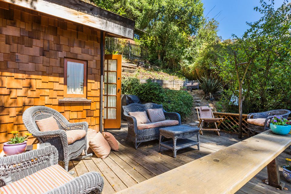 The "Cubby", designed by architect Bernard Maybeck, started out as a garage and was later expanded into an eclectic 724 sq ft cottage with one bedroom. | www.facebook.com/SmallHouseBliss