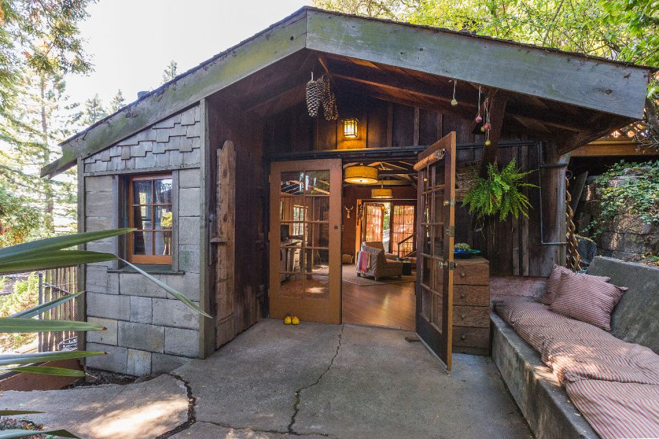 The "Cubby", designed by architect Bernard Maybeck, started out as a garage and was later expanded into an eclectic 724 sq ft cottage with one bedroom. | www.facebook.com/SmallHouseBliss