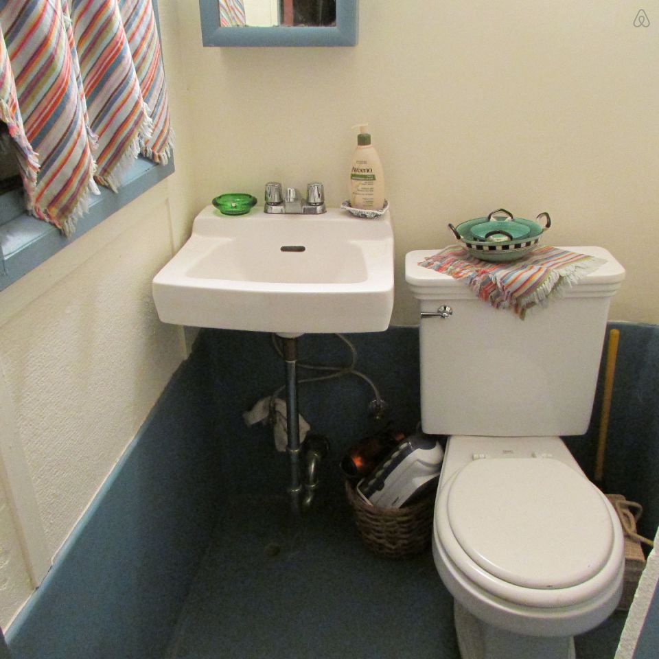 The "Cubby", designed by architect Bernard Maybeck, started out as a garage and was later expanded into an eclectic 724 sq ft cottage with one bedroom. | www.facebook.com/SmallHouseBliss