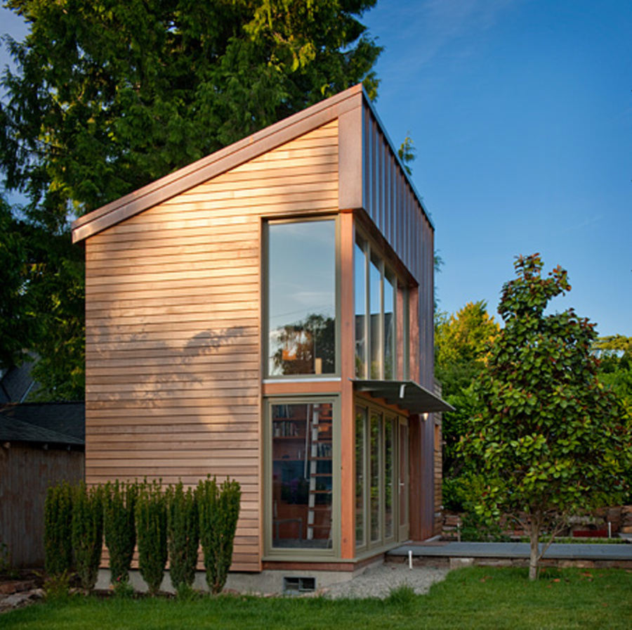 This copper, glass and cedar "garden pavilion" serves as music studio, guest house and home office. The 350 sq ft structure includes a full bathroom and kitchenette. | www.facebook.com/SmallHouseBliss