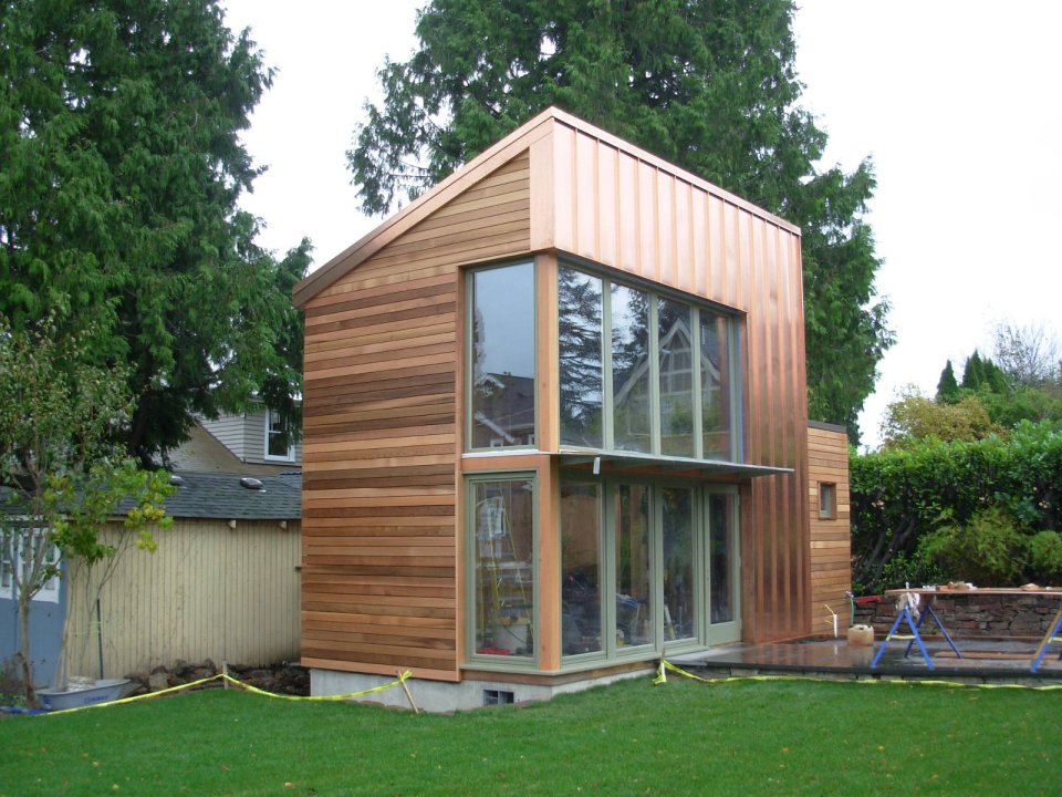 This copper, glass and cedar "garden pavilion" serves as music studio, guest house and home office. The 350 sq ft structure includes a full bathroom and kitchenette. | www.facebook.com/SmallHouseBliss