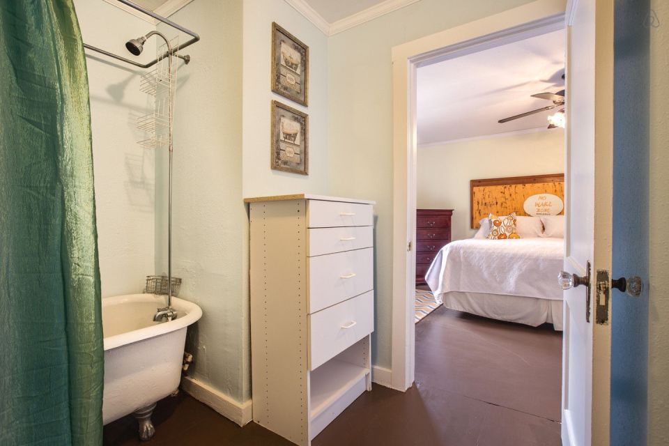 A ramshackle exterior conceals a modern one-bedroom home in this dock house perched over a river within sight of downtown Tampa, Florida. | www.facebook.com/SmallHouseBliss