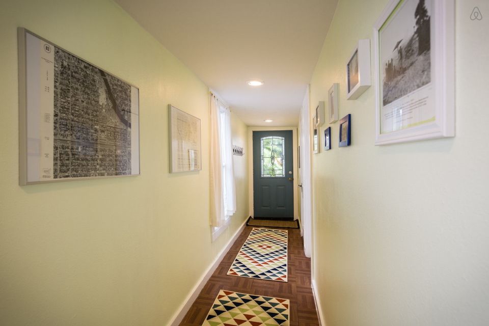 A ramshackle exterior conceals a modern one-bedroom home in this dock house perched over a river within sight of downtown Tampa, Florida. | www.facebook.com/SmallHouseBliss