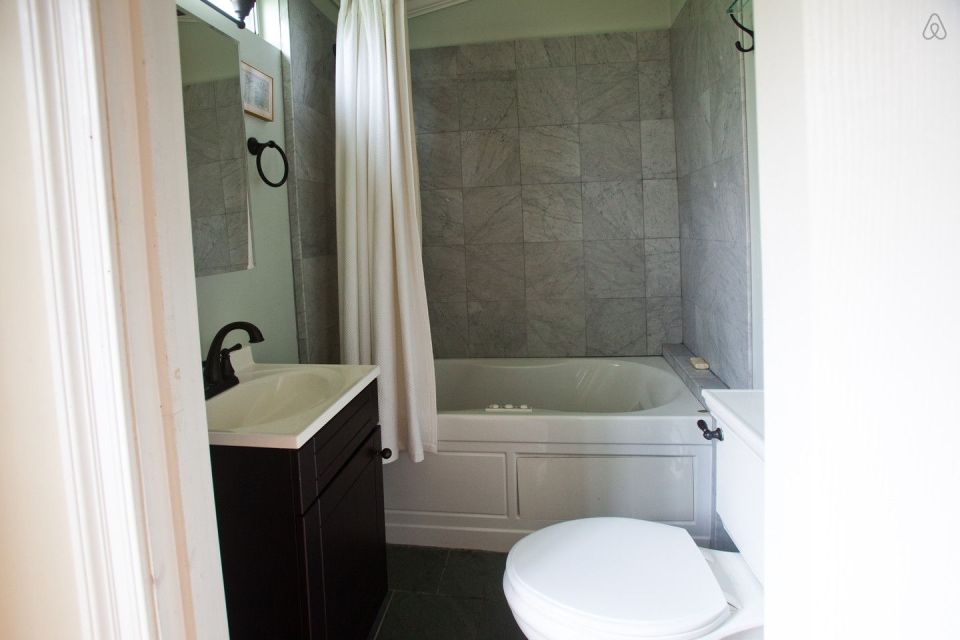 A tiny "shotgun" cottage in the Irish Channel neighborhood of New Orleans. It has one bedroom in roughly 400 sq ft. | www.facebook.com/SmallHouseBliss