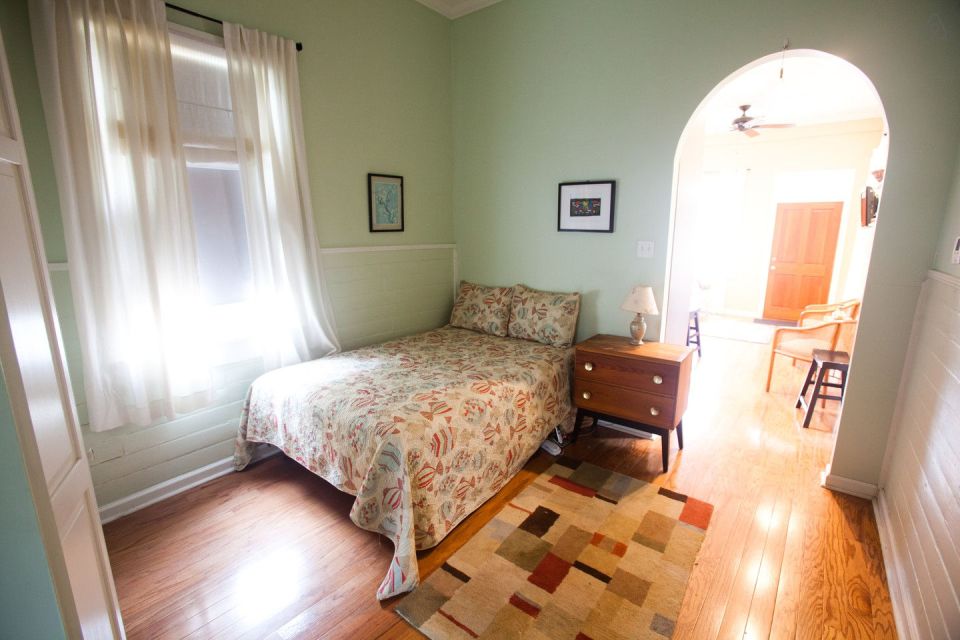 A tiny "shotgun" cottage in the Irish Channel neighborhood of New Orleans. It has one bedroom in roughly 400 sq ft. | www.facebook.com/SmallHouseBliss