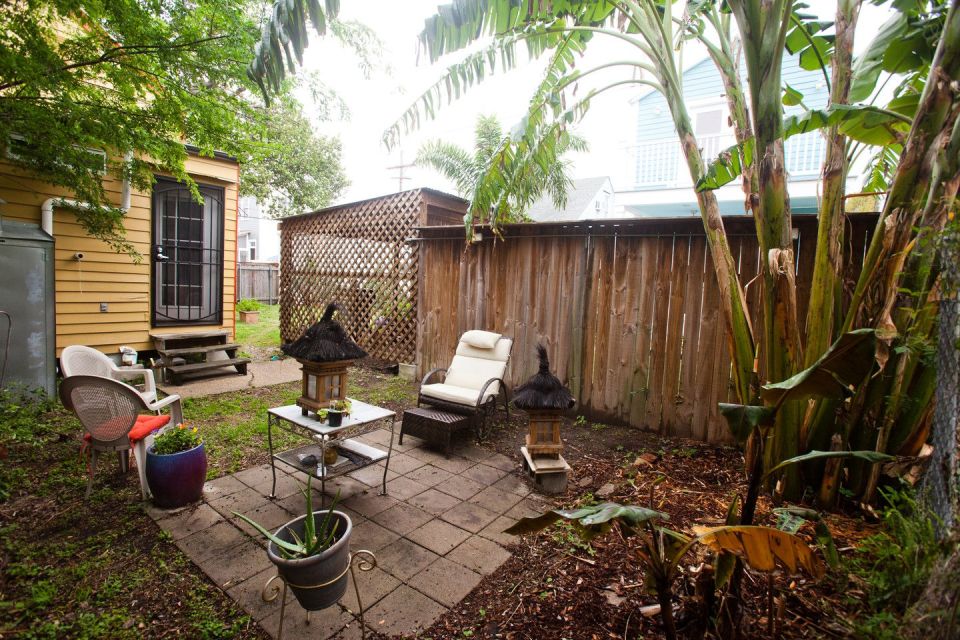 A tiny "shotgun" cottage in the Irish Channel neighborhood of New Orleans. It has one bedroom in roughly 400 sq ft. | www.facebook.com/SmallHouseBliss