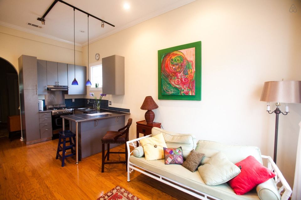 A tiny "shotgun" cottage in the Irish Channel neighborhood of New Orleans. It has one bedroom in roughly 400 sq ft. | www.facebook.com/SmallHouseBliss