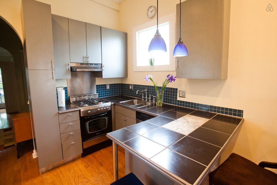 A tiny "shotgun" cottage in the Irish Channel neighborhood of New Orleans. It has one bedroom in roughly 400 sq ft. | www.facebook.com/SmallHouseBliss