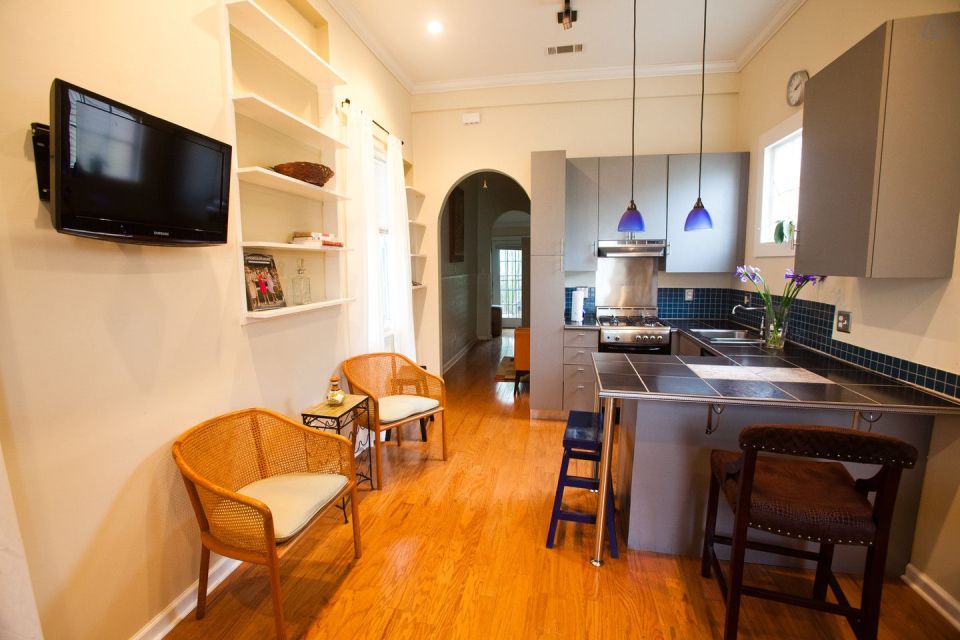 A tiny "shotgun" cottage in the Irish Channel neighborhood of New Orleans. It has one bedroom in roughly 400 sq ft. | www.facebook.com/SmallHouseBliss