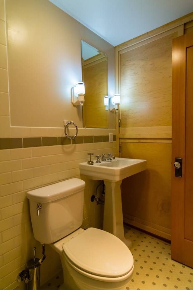 Though just 469 sq ft total, Susan's backyard cottage squeezes in spiral stairs to the loft bedroom. | www.facebook.com/SmallHouseBliss
