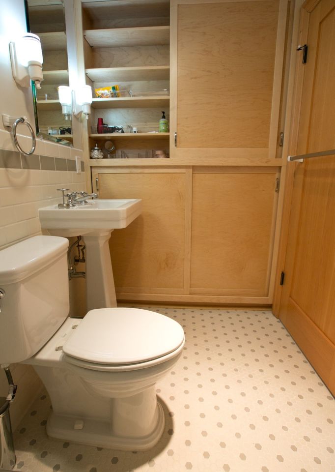 Though just 469 sq ft total, Susan's backyard cottage squeezes in spiral stairs to the loft bedroom. | www.facebook.com/SmallHouseBliss