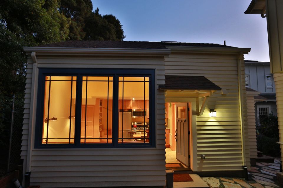 Though just 469 sq ft total, Susan's backyard cottage squeezes in spiral stairs to the loft bedroom. | www.facebook.com/SmallHouseBliss