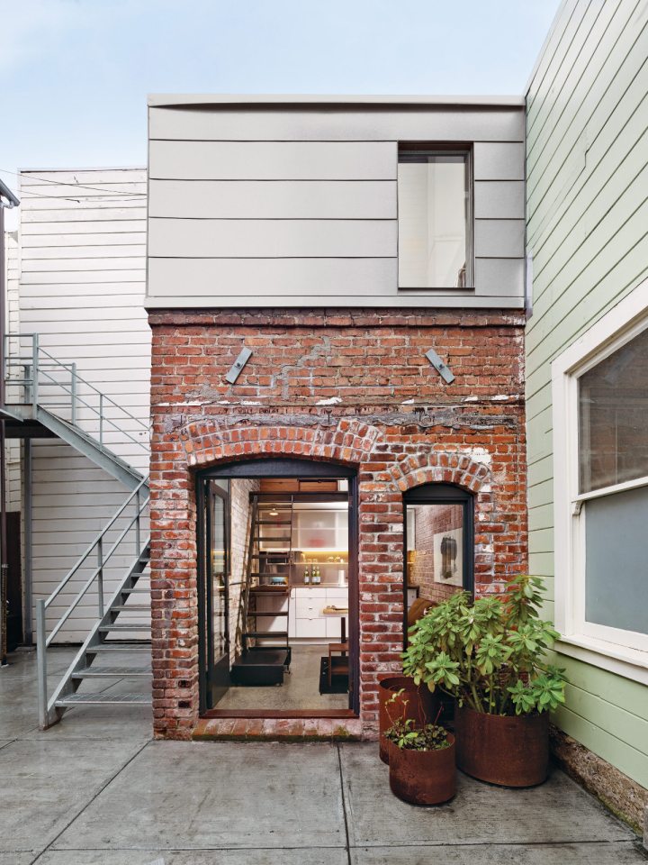 The Brick House, a self-contained guest suite built within a 94 sq ft former laundry boiler room. | www.facebook.com/SmallHouseBliss